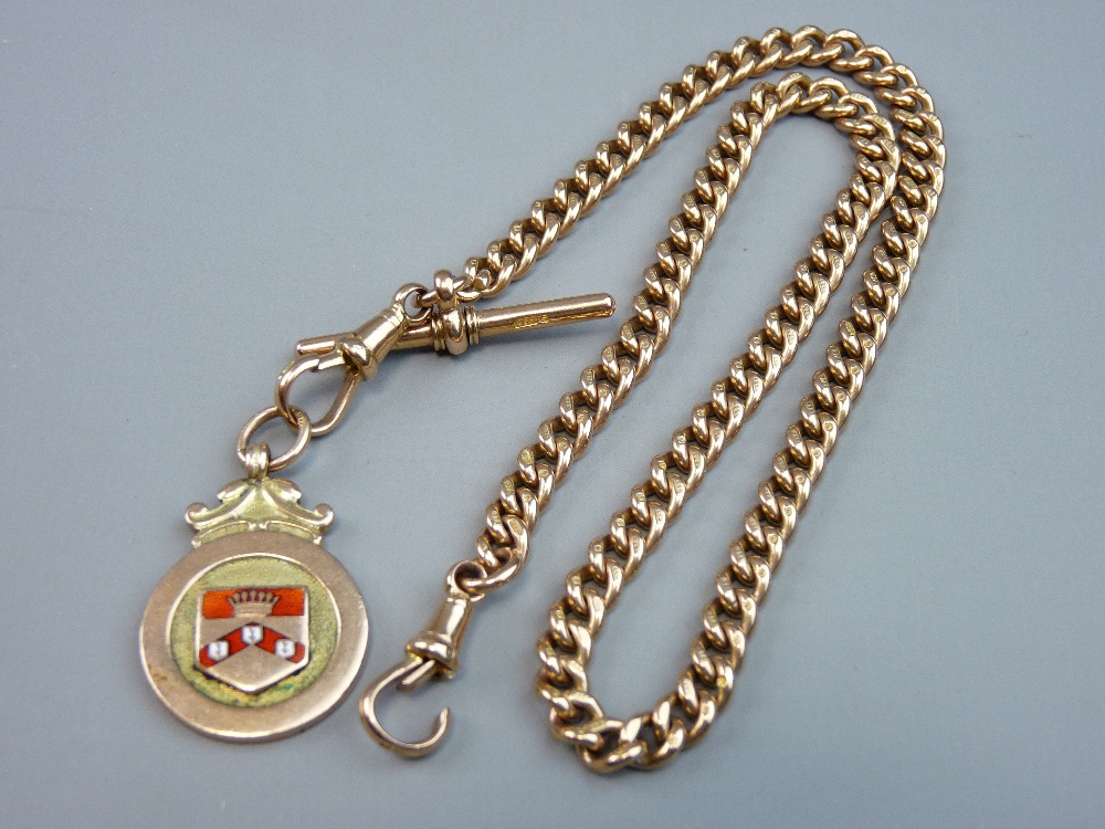 A NINE CARAT GOLD ALBERT with pendant fob, presentation inscription to 'T N Garstang, 1929', 53.5