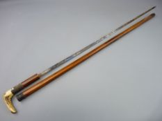 A MALACCA CASED HORN HANDLED SWORDSTICK, the 75 cms blade with floral decoration (blade rusty,