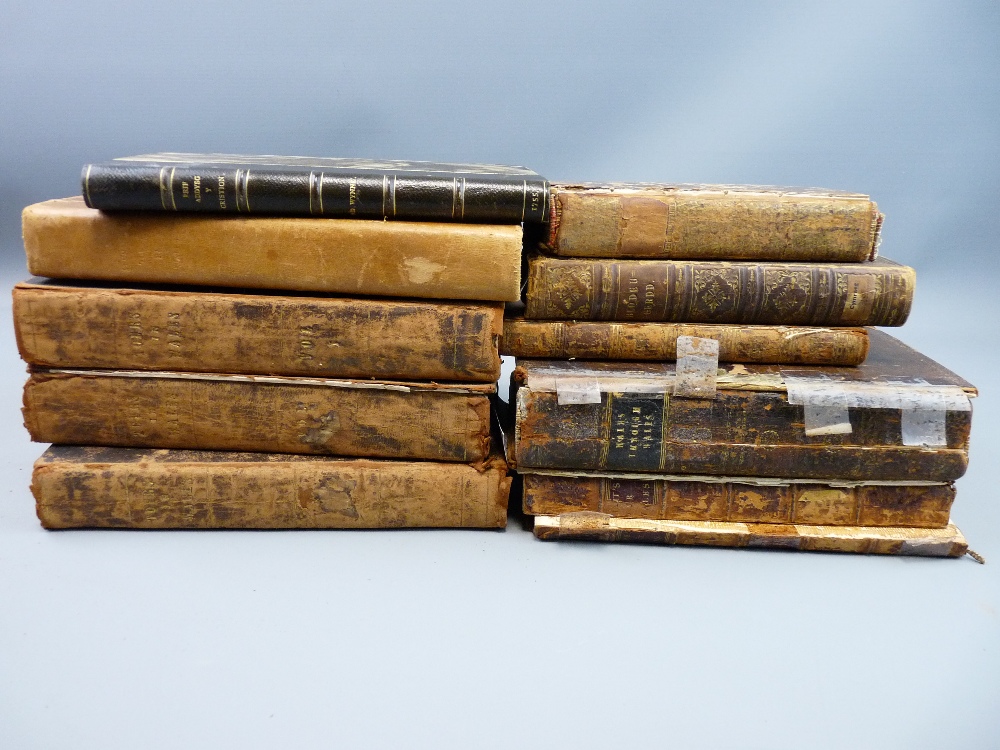 A PARCEL OF APPROXIMATELY TEN LEATHER SPINE BOOKS for restoration including three volumes of '