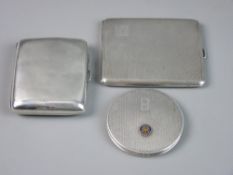 TWO HALLMARKED SILVER CIGARETTE CASES and a lady's compact, a plain case marked Chester 1911, a slim