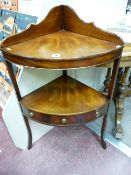 A REPRODUCTION MAHOGANY CORNER STAND with shaped gallery top and bow front shelf, the under tier