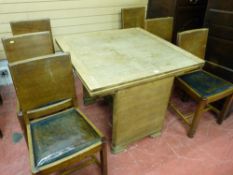 A LIGHT OAK POLISHED DRAW LEAF DINING TABLE and six similar period curved back dining chairs with