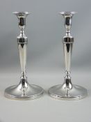 A PAIR OF GEORGE III SILVER CANDLESTICKS, the urn shaped candleholders with detachable sconces on