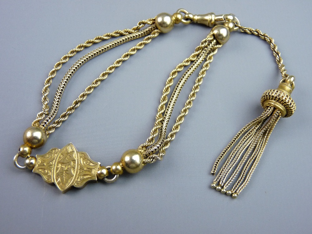 A YELLOW METAL TRIPLE STRAND TWIST BRACELET with shaped floral link and tassel, 19.5 grms