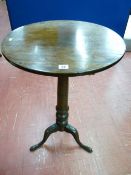 A GEORGIAN MAHOGANY TRIPOD TABLE, the circular tilt top on a turned column base with splayed feet,