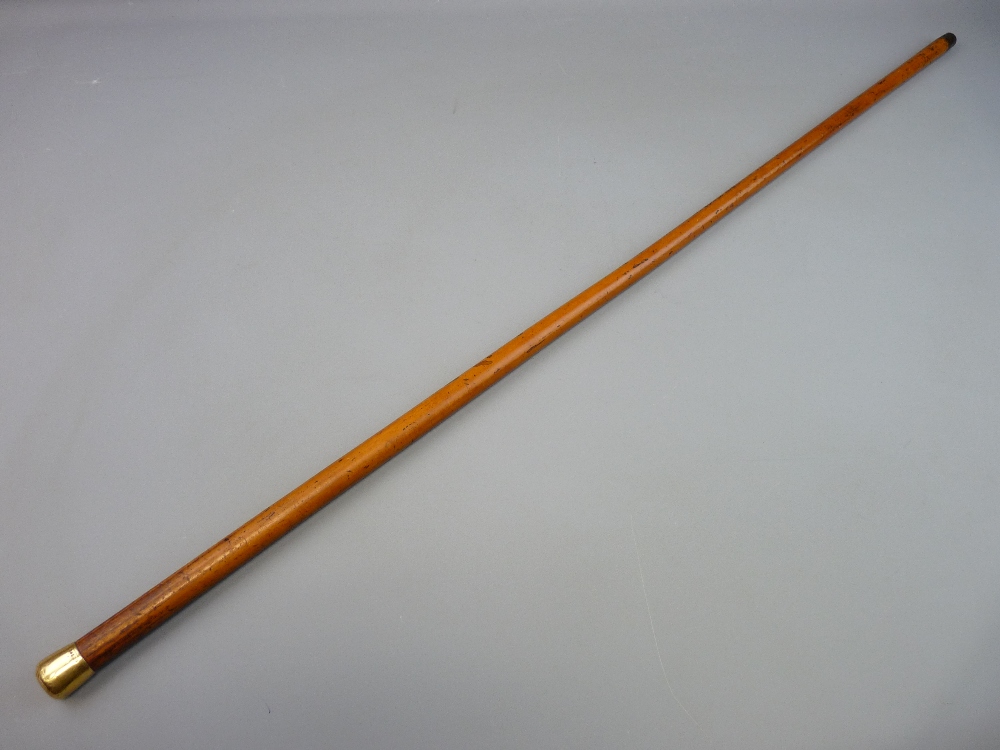 A MALACCA WALKING CANE with eighteen carat gold pommel top, 93.5 cms long