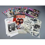 THE BEATLES MEMORABILIA to include two official Fan Club cards and newsletters, thirty eight