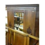 A CIRCA 1900 INLAID MAHOGANY WARDROBE with central mirrored door and base drawer, 203 cms high,