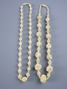 TWO CARVED IVORY BALL & FLORAL NECKLACES