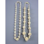 TWO CARVED IVORY BALL & FLORAL NECKLACES