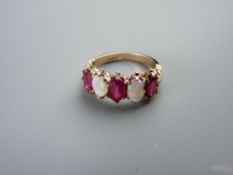 A FIFTEEN CARAT GOLD RUBY (three) & OPAL (two) DRESS RING, all oval cut stones, size 'O/P', 4.5