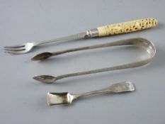 TWO ITEMS OF DUBLIN SILVER and an ivory handled pickle fork, to include a pair of early 19th Century