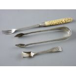 TWO ITEMS OF DUBLIN SILVER and an ivory handled pickle fork, to include a pair of early 19th Century