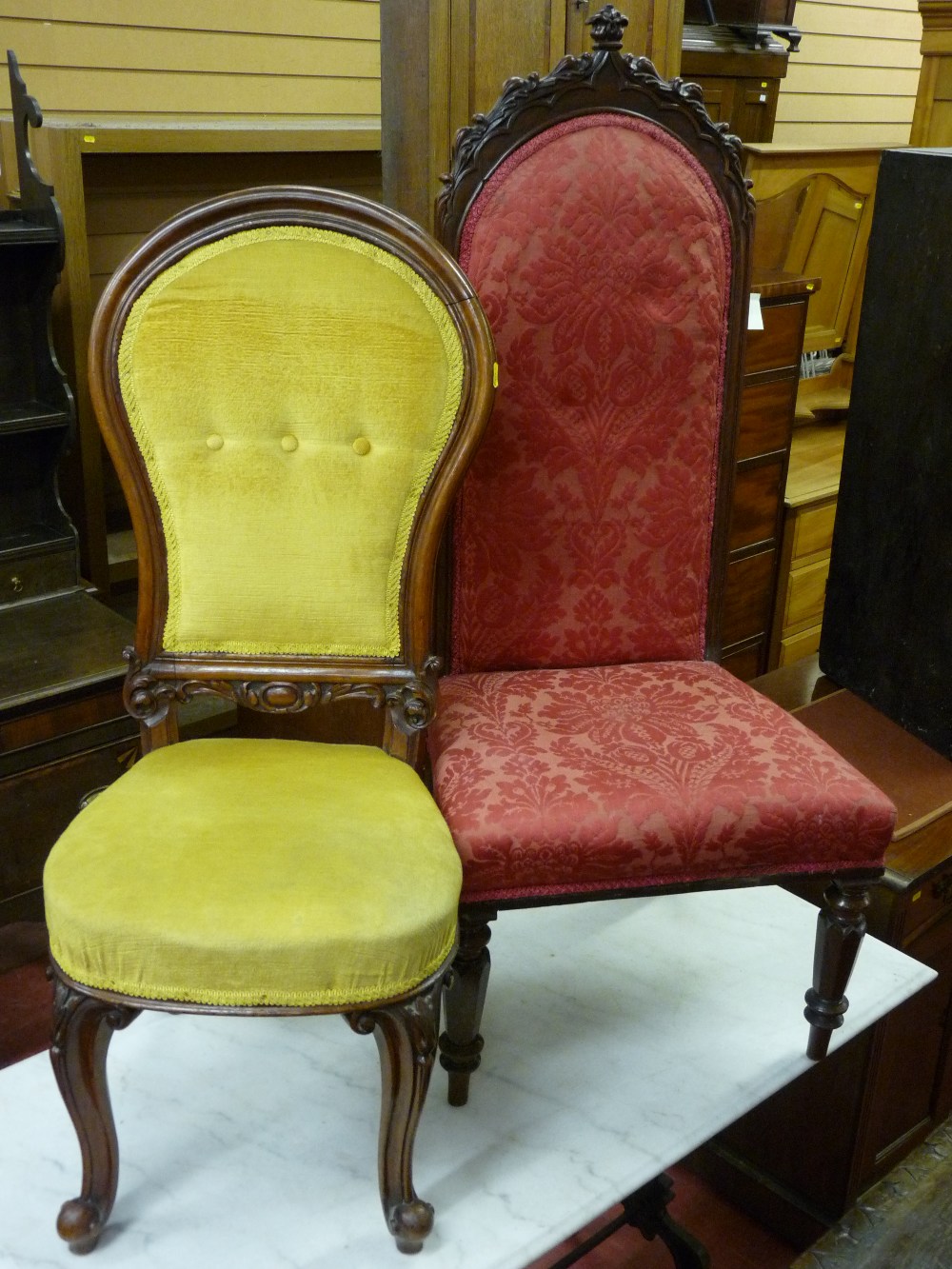 TWO LATE VICTORIAN UPHOLSTERED HALL CHAIRS, a rosewood example with high back having Gothic style