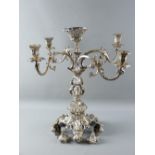 AN ELABORATE LATE 19th/EARLY 20th CENTURY ELECTROPLATED FOUR BRANCH TABLE CENTREPIECE on three heavy