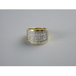 AN EIGHTEEN CARAT GOLD DRESS RING with fifty tiny diamonds in five rows of ten stones each, size '