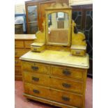 AN EDWARDIAN MAHOGANY MIRROR FRONT WARDROBE, a similar period chest of three long over two short