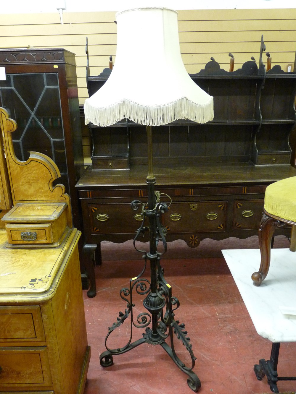 A CIRCA 1900 WROUGHT IRON RISE & FALL LAMP HOLDER (converted for electricity) with modern lampshade