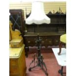 A CIRCA 1900 WROUGHT IRON RISE & FALL LAMP HOLDER (converted for electricity) with modern lampshade