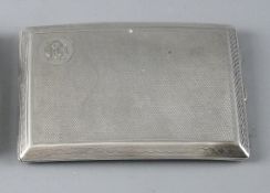 A GENT'S ENGINE TURNED SILVER CIGARETTE CASE with patterned border, slightly curved, 5 troy ozs,
