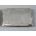 A GENT'S ENGINE TURNED SILVER CIGARETTE CASE with patterned border, slightly curved, 5 troy ozs,