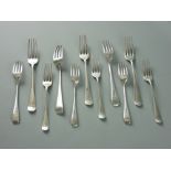 A PARCEL OF SIX SILVER DESSERT FORKS, 8.7 troy ozs, Sheffield 1906 and a parcel of five matching