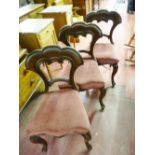 THREE GOOD VICTORIAN SIDE CHAIRS, the triple arched top backs and centre rail with carved