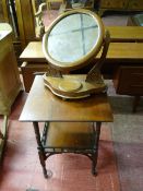 A VICTORIAN MAHOGANY SWING TOILET MIRROR and a two tier Edwardian table with galleried under shelf