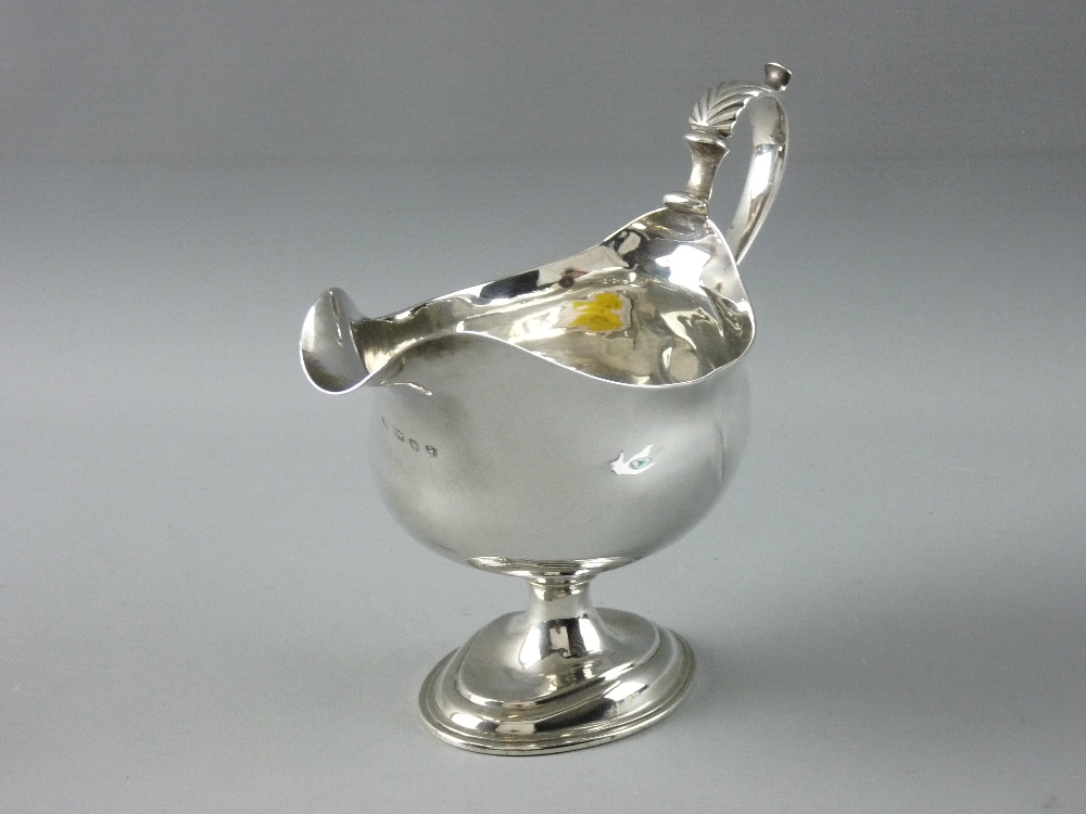 AN OVAL BASED SILVER SAUCE BOAT, 7 troy ozs, London 1784 by Thomas Daniel (impact damage to the
