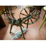 AN ANTIQUE OAK & ELM SPINNING WHEEL, 82.5 cms high, 80 cms approximate width