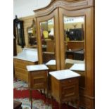 A GOOD QUALITY MID COLOUR FRENCH BEDROOM SUITE of double wardrobe with twin mirrored doors over