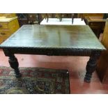 A VICTORIAN CARVED OAK LIBRARY TABLE, the rectangular leaf carved edge top over a carved frieze with