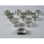 A PARCEL OF TEN MIXED SILVER NAPKIN RINGS, total 7.5 troy ozs