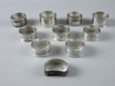 A PARCEL OF TEN MIXED SILVER NAPKIN RINGS, total 7.5 troy ozs