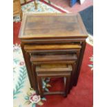 A QUARTETTO OF CHINESE HARDWOOD SIDE TABLES, 66 cms high, 48.5 cms wide, 32.75 cms deep the largest