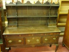 A 19th CENTURY INLAID OAK SHROPSHIRE DRESSER, the shaped open top rack with lower drawers, the