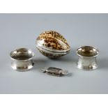 FOUR ITEMS OF SMALL SILVER to include a Tiger Cowrie shell container marked 'Italy 925', two