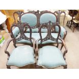 AN EDWARDIAN MAHOGANY SEVEN PIECE SALON SUITE of two seater couch, two armchairs and four side