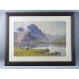 WARREN WILLIAMS ARCA watercolour - Ogwen Lake with boat and figure, signed, 32.5 x 50 cms