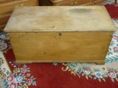 A VICTORIAN STRIPPED PINE CAPTAIN'S CHEST with brass carry handles, 53 cms high, 113.5 cms wide,