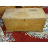 A VICTORIAN STRIPPED PINE CAPTAIN'S CHEST with brass carry handles, 53 cms high, 113.5 cms wide,