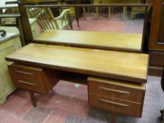 GOOD G-PLAN TEAK LONG MIRRORED DRESSING TABLE with central jewellery drawer, 119 cms high overall,