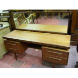 GOOD G-PLAN TEAK LONG MIRRORED DRESSING TABLE with central jewellery drawer, 119 cms high overall,