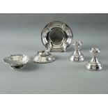 A PAIR OF SMALL SILVER CIRCULAR PEDESTAL DISHES with wavy borders, 2.5 troy ozs, Birmingham 1914,