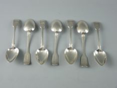 A SET OF SEVEN FIDDLE PATTERNED SILVER DESSERT SPOONS with crested handles, 8.2 troy ozs, Exeter