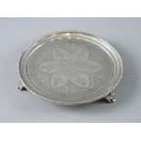 A HALLMARKED SILVER CIRCULAR PRESENTATION CARD TRAY, the 18 cms diameter tray with beaded edge and