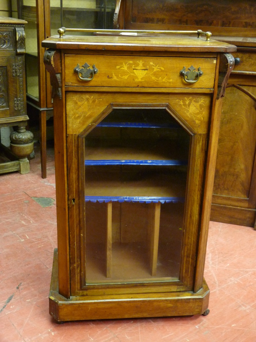 A VICTORIAN INLAID WALNUT MUSIC CABINET, the top section with urn inlay and shallow brass rail above