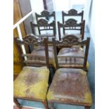 A SET OF SIX EDWARDIAN MAHOGANY DINING CHAIRS with sunburst top rail decoration, spindleback