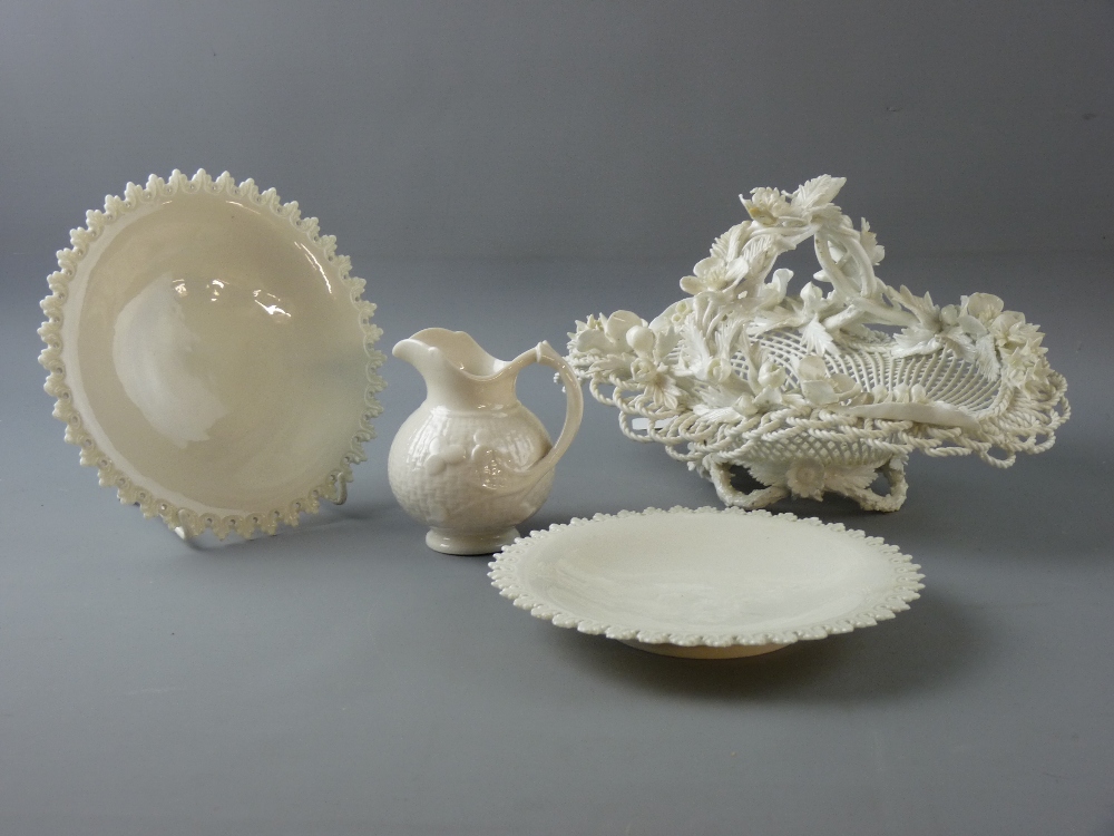 FOUR PIECES OF CREAM WARE STYLE PORCELAIN to include a Belleek jug with shamrock decoration in