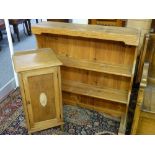 AN ANTIQUE STRIPPED PINE PLATE RACK with shaped sides and a bedside pot cupboard, 98 x 95 cms the